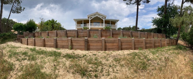 comment retenir le sable d'un terrain avec un mur de soutenement en bois à lacanu
